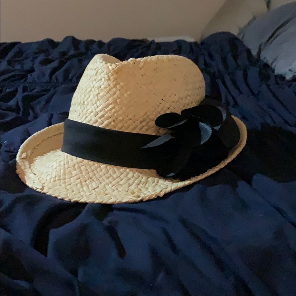 Fedora with black flower.